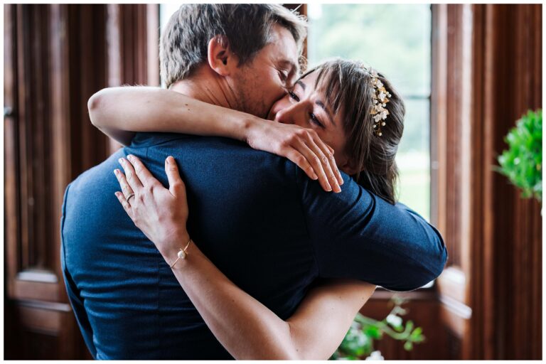 Canford School Wedding Photography - couple hugging after ceremony